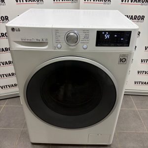 Begagnad LG F2J7HM1W kombinerad tvättmaskin och torktumlare vit